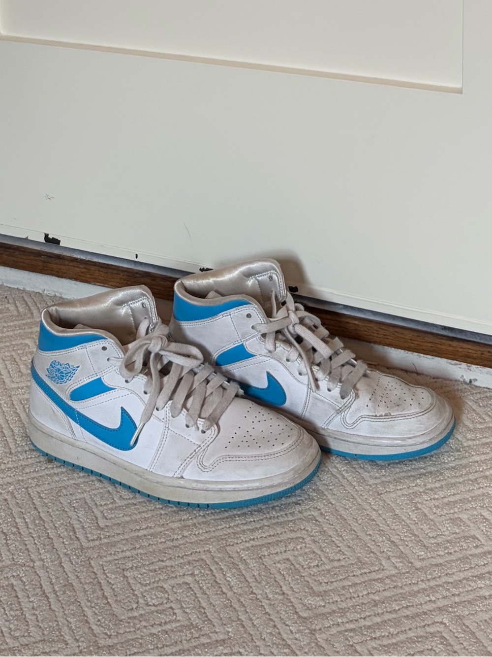 Nike White and Blue High-Top Sneakers with Blue Swoosh
